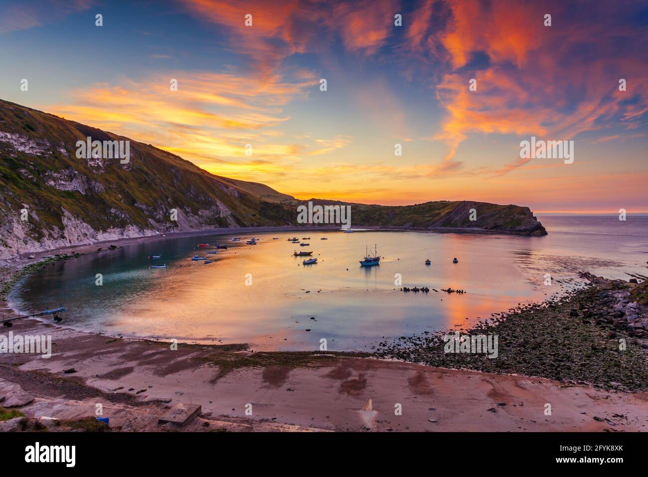 A glorious sunrise at the wonderful Lulworth Cove in Dorset. Stock Photo