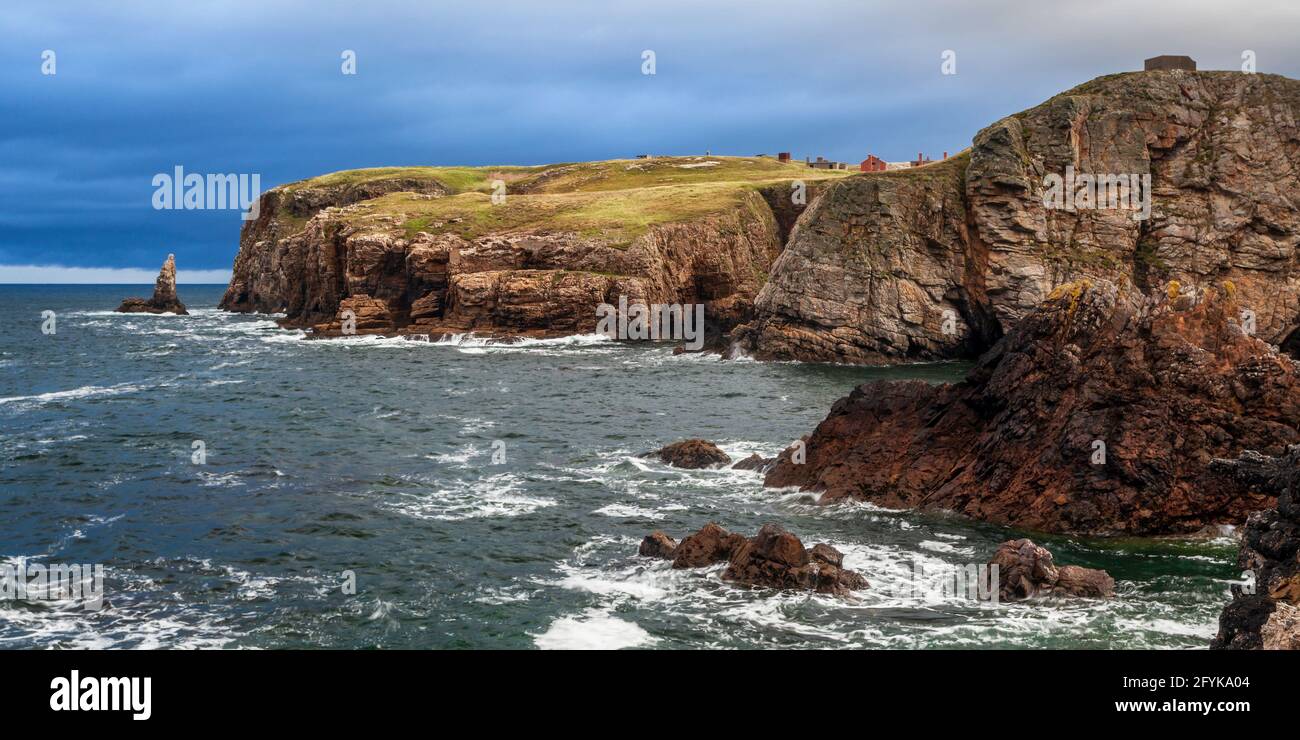 Lenan Head is the site of a defensive fort which guarded the mouth of Lough Swilly during the world wars. The fort ruins can be seen on the cliff top. Stock Photo