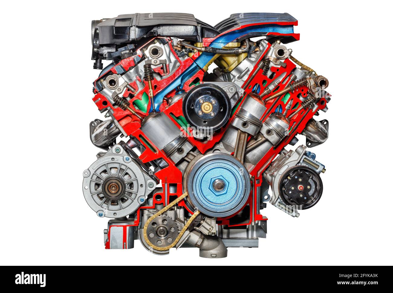 Cutaway of an internal combustion engine of a modern car at an exhibition stand, isolated on a white background. Stock Photo