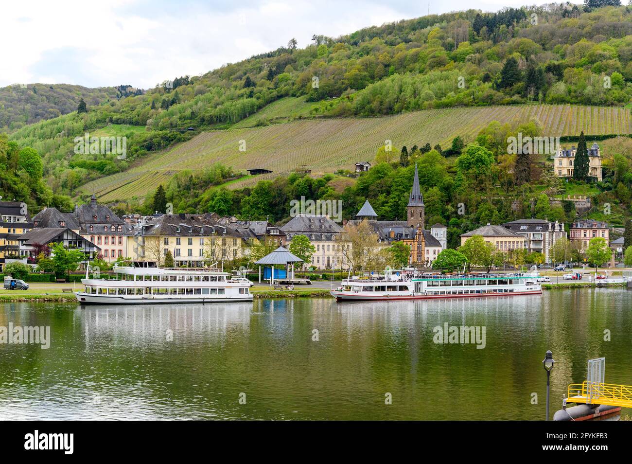 Traben-Trarbach am Mosel. Beautiful historical town on the loop of romantic Moselle river. Ship, ships, church with a hill. Rhineland-Palatinate, Germ Stock Photo