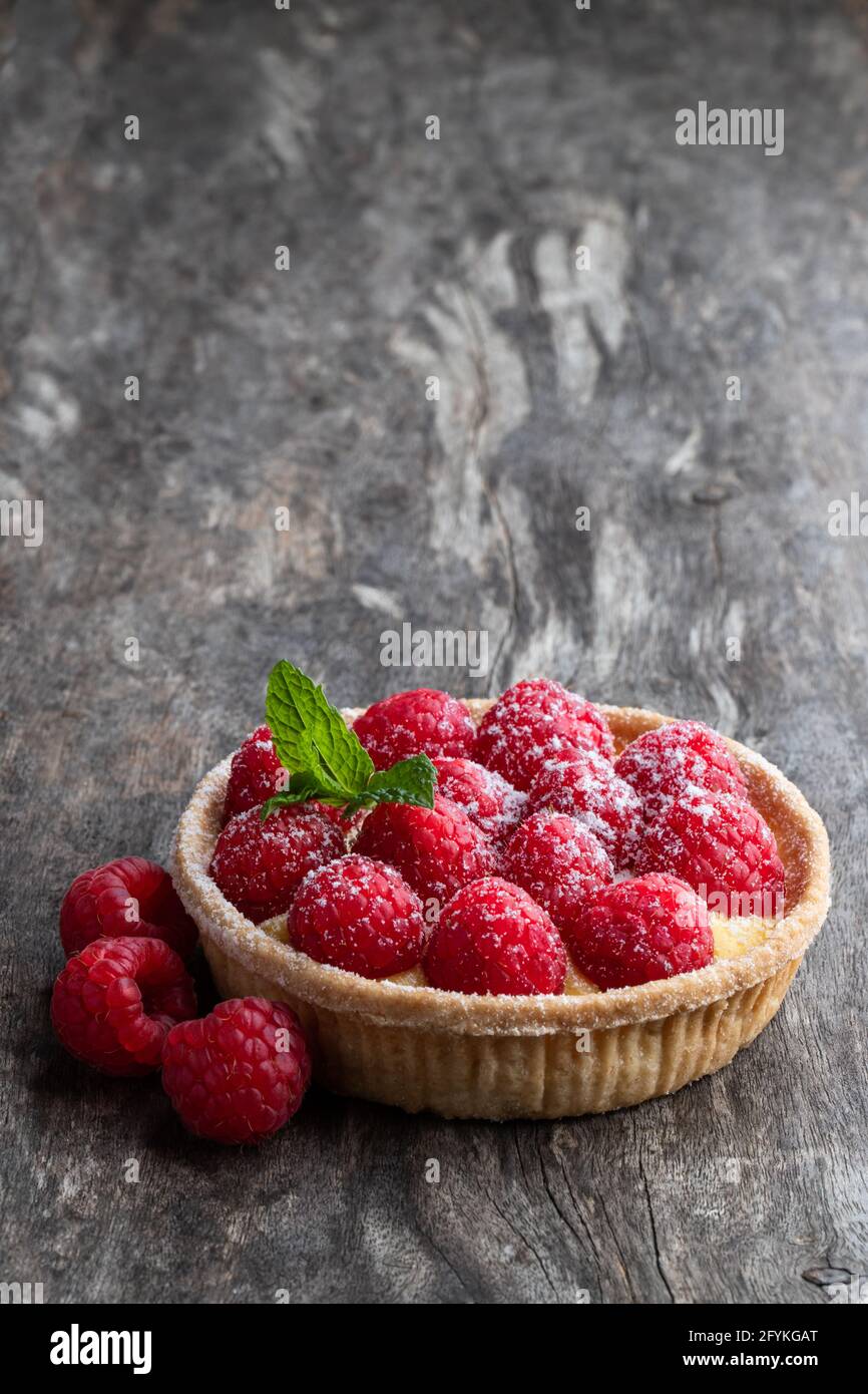 Fresh  homemade fruit tart with raspberry and lemon curd isolated on white Stock Photo