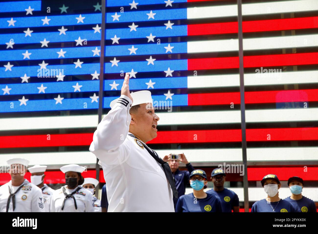 Aviation Ordnanceman First Class Jessi Arnold takes the oath of enlistment, to re-enlist in the Navy, in Times Square during the annual Fleet Week in New York City, U.S., May 28, 2021.  REUTERS/Brendan McDermid Stock Photo