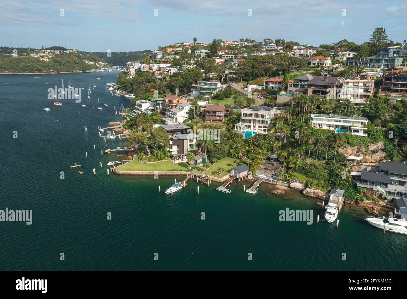 Aerial view of prestige houses along the harbour in the Sydney suburb of Seaforth, NSW, Australia. Stock Photo