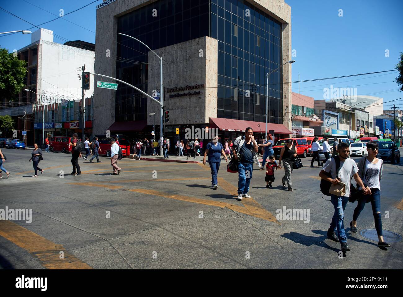 People walking though Constitution Avenue in Tijuana Mexico Stock Photo