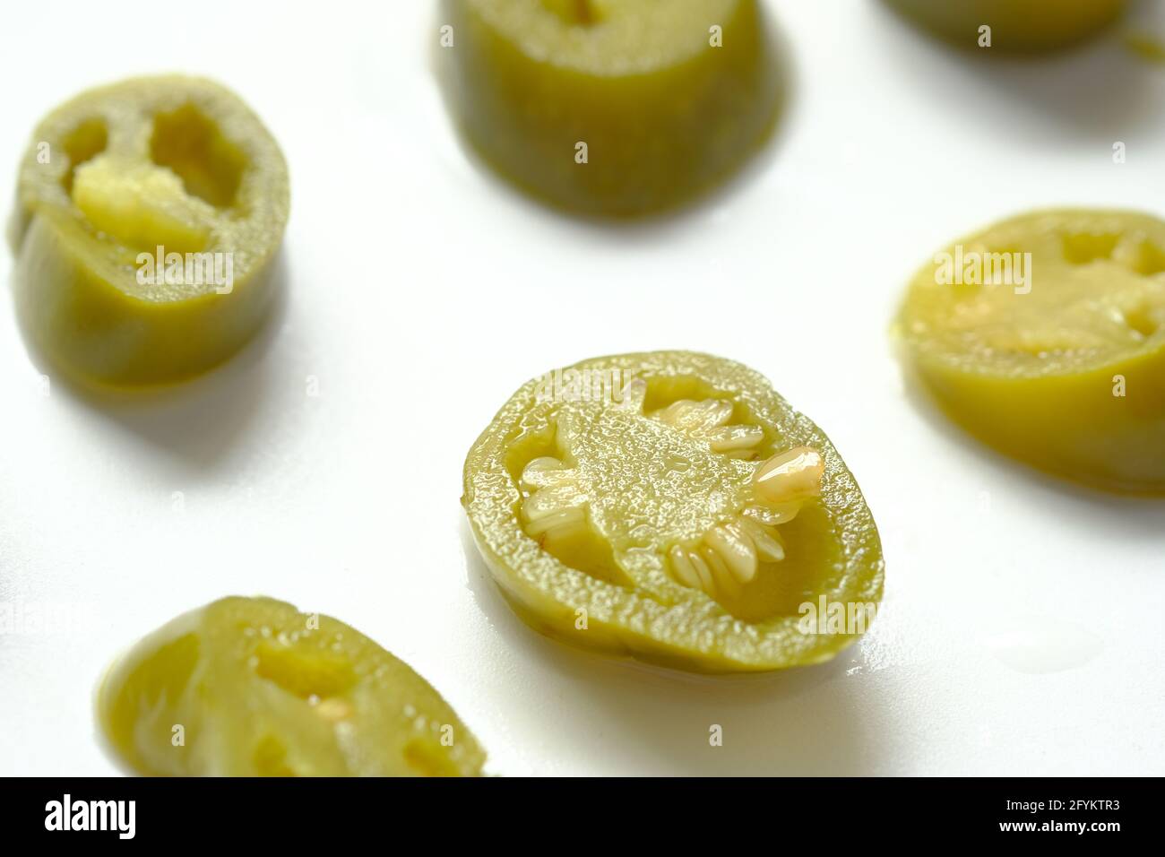 slice of Jalapeno peppers on white background Stock Photo Alamy