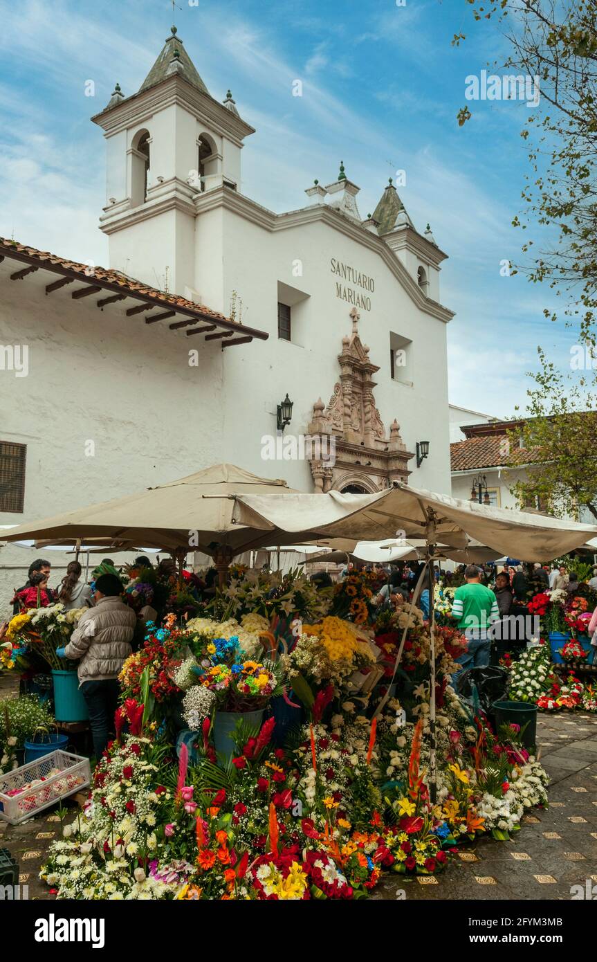 Flower Market and Iglesia del Carmen de Ascuncion, Cuenca, Ecuador Stock Photo