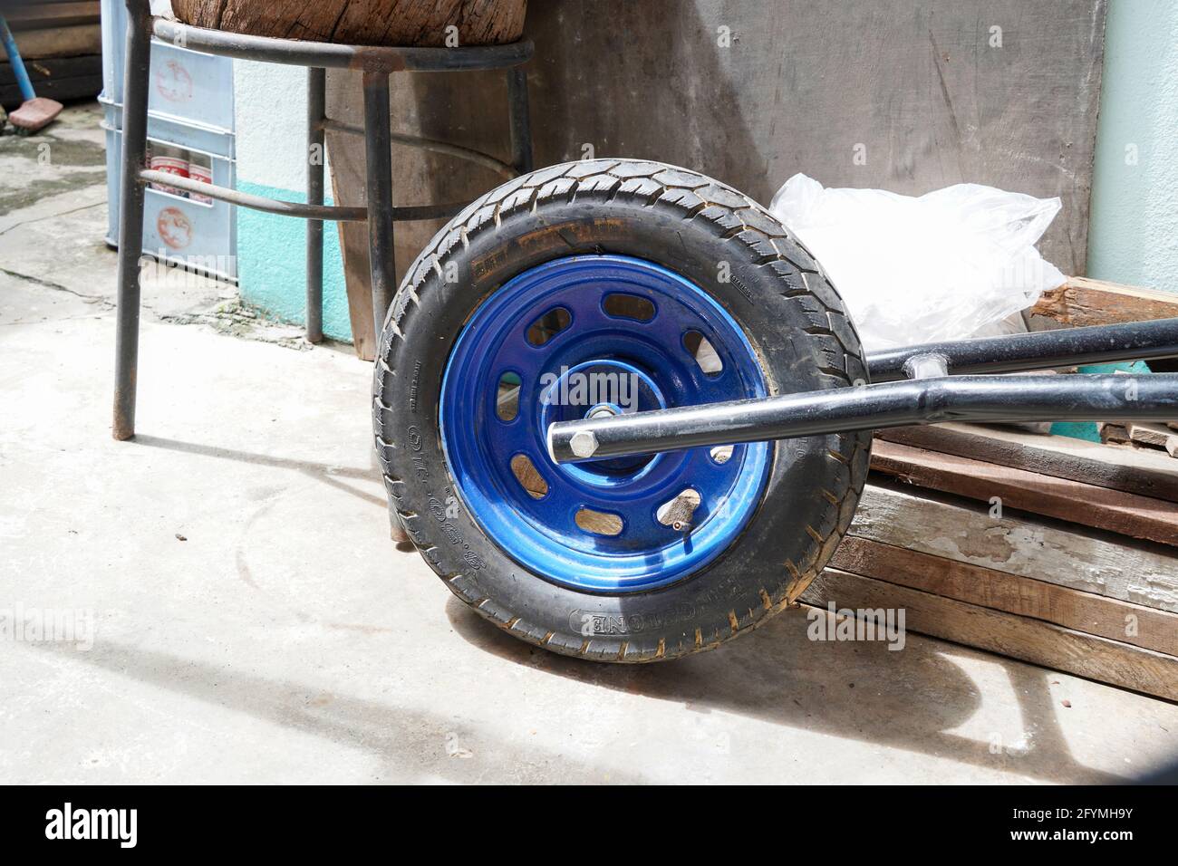 Metal wheel with tire, transportation equipment machine Stock Photo