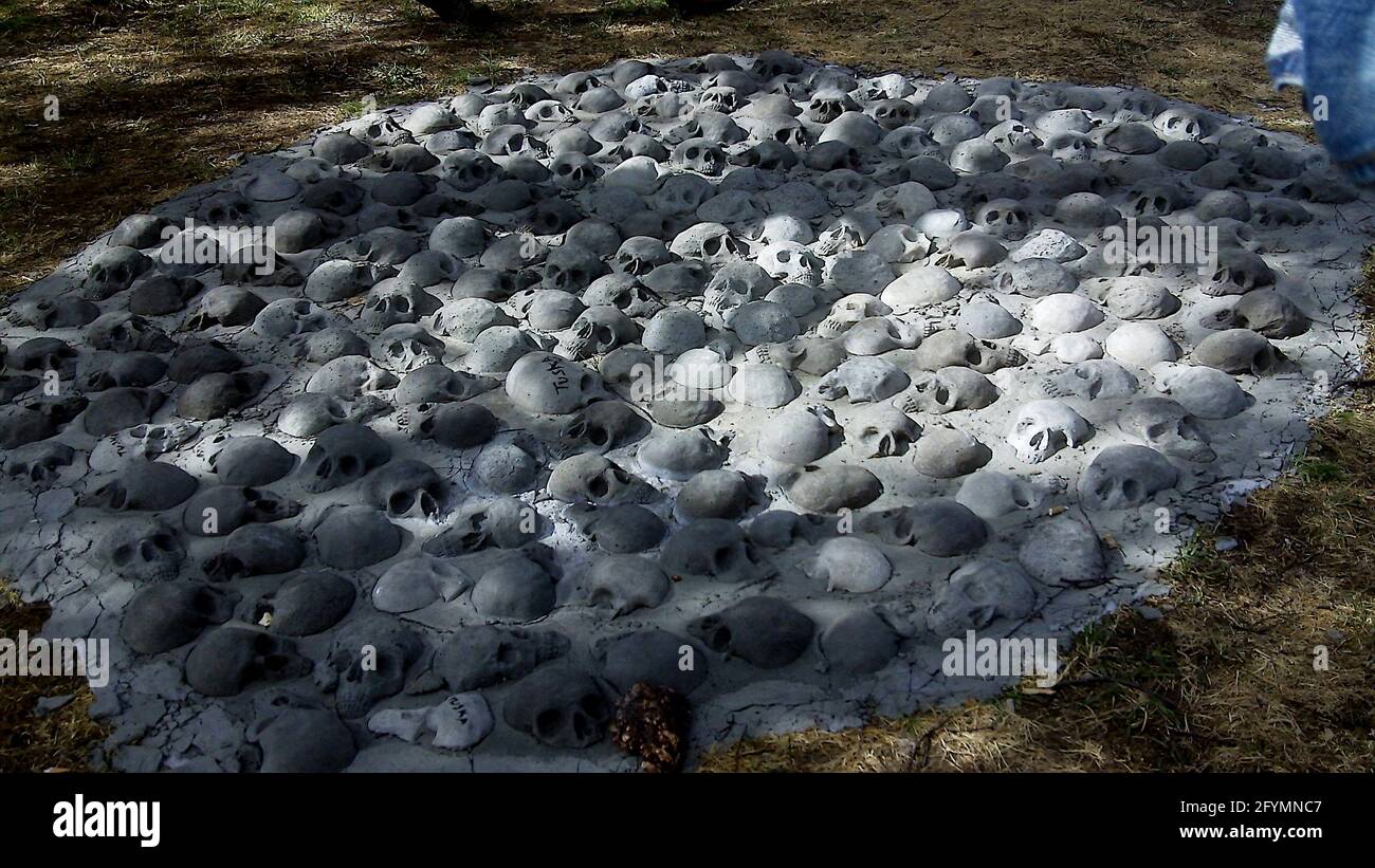 Skulls on the ground sculpture installation at Tuska Open Air Festival in Helsinki Finland Stock Photo
