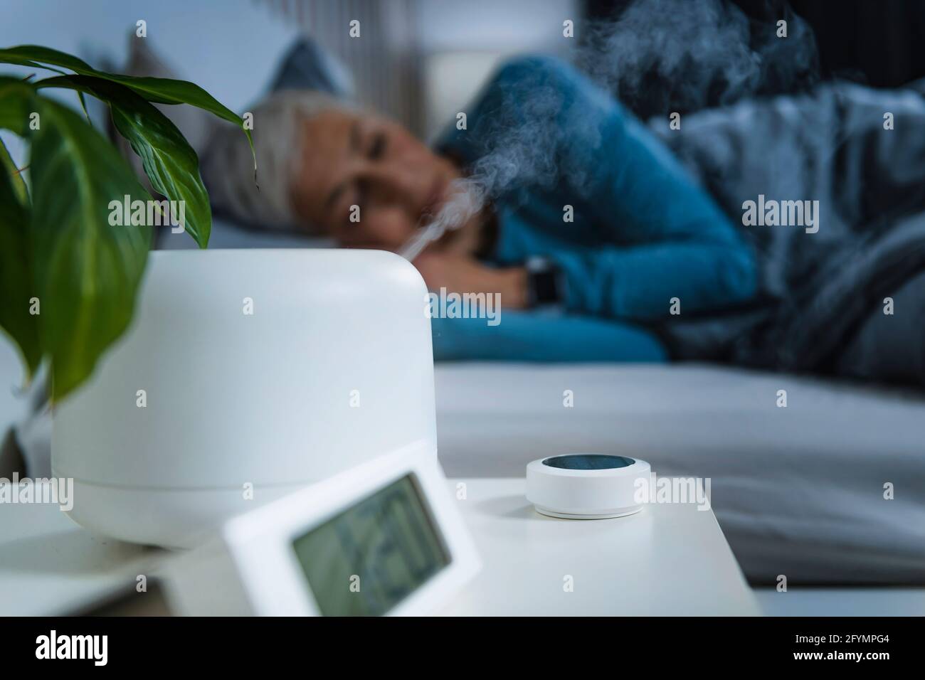 Air humidifier in bedroom Stock Photo Alamy