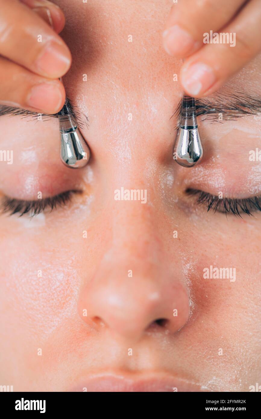 Facial using drainage sticks Stock Photo Alamy