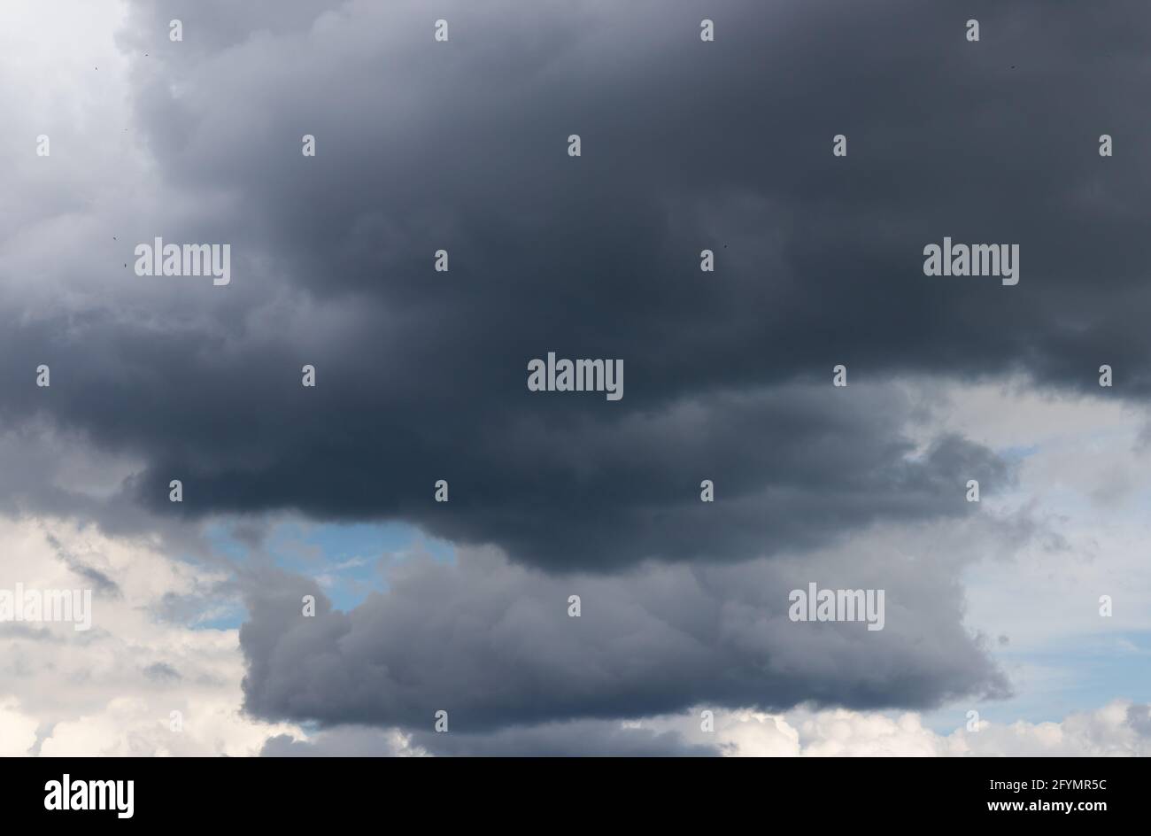 Beautiful view of thick, dark rain clouds in the sky Stock Photo - Alamy