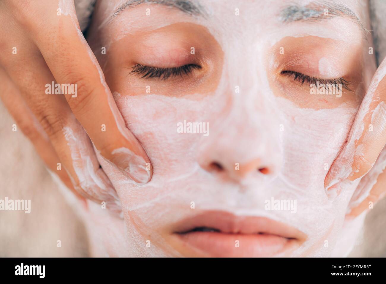 Jawline rejuvenating face mask treatment Stock Photo