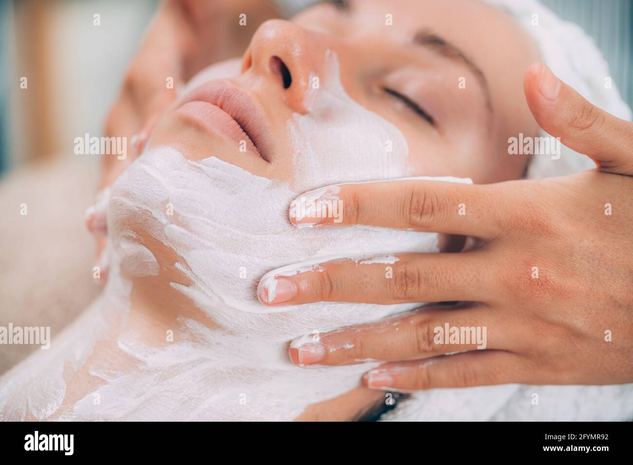 Rejuvenating cosmetic face mask Stock Photo