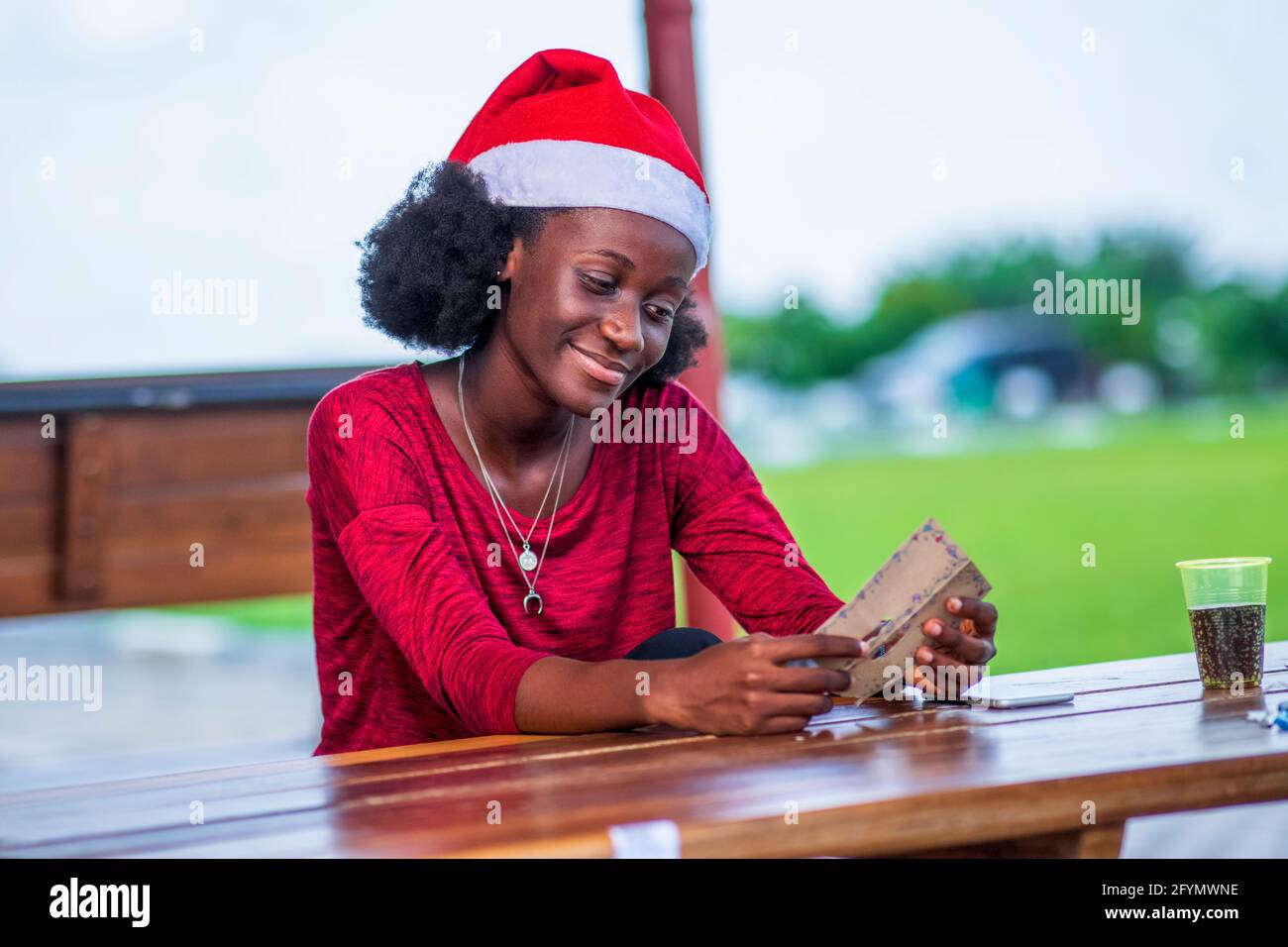 Female santa hat hi-res stock photography and images - Alamy