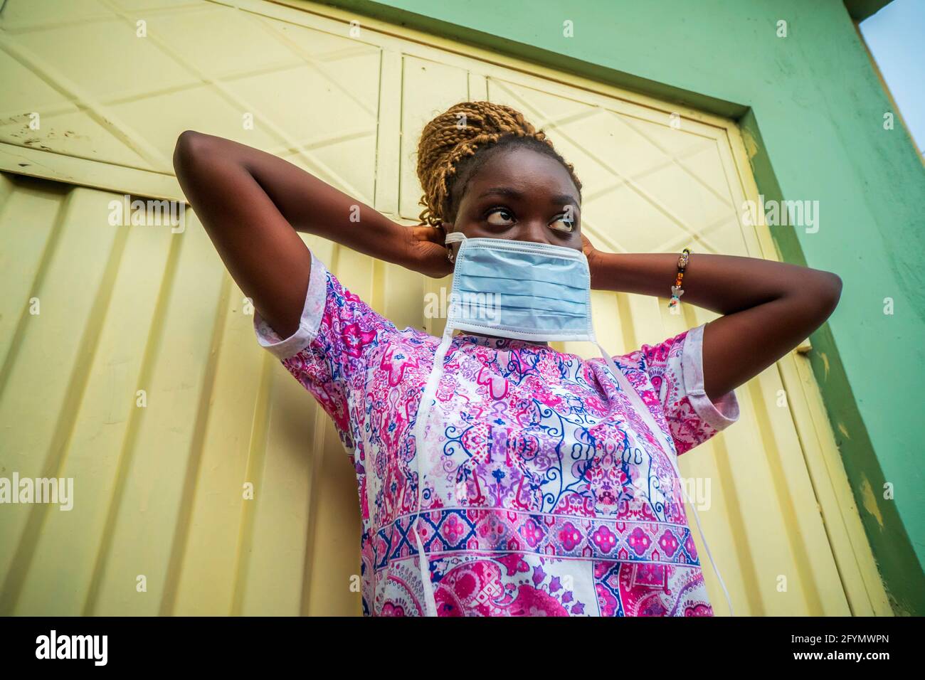 African woman face mask hi-res stock photography and images - Alamy