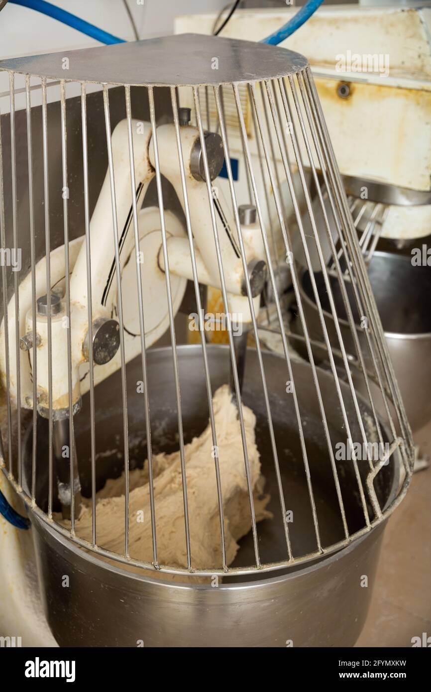 Making bread dough in kneading machine. Professional bakery equipment Stock Photo Alamy
