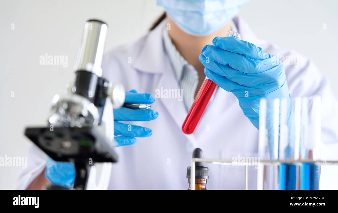 Forensic scientist analysing dna hi-res stock photography and images ...