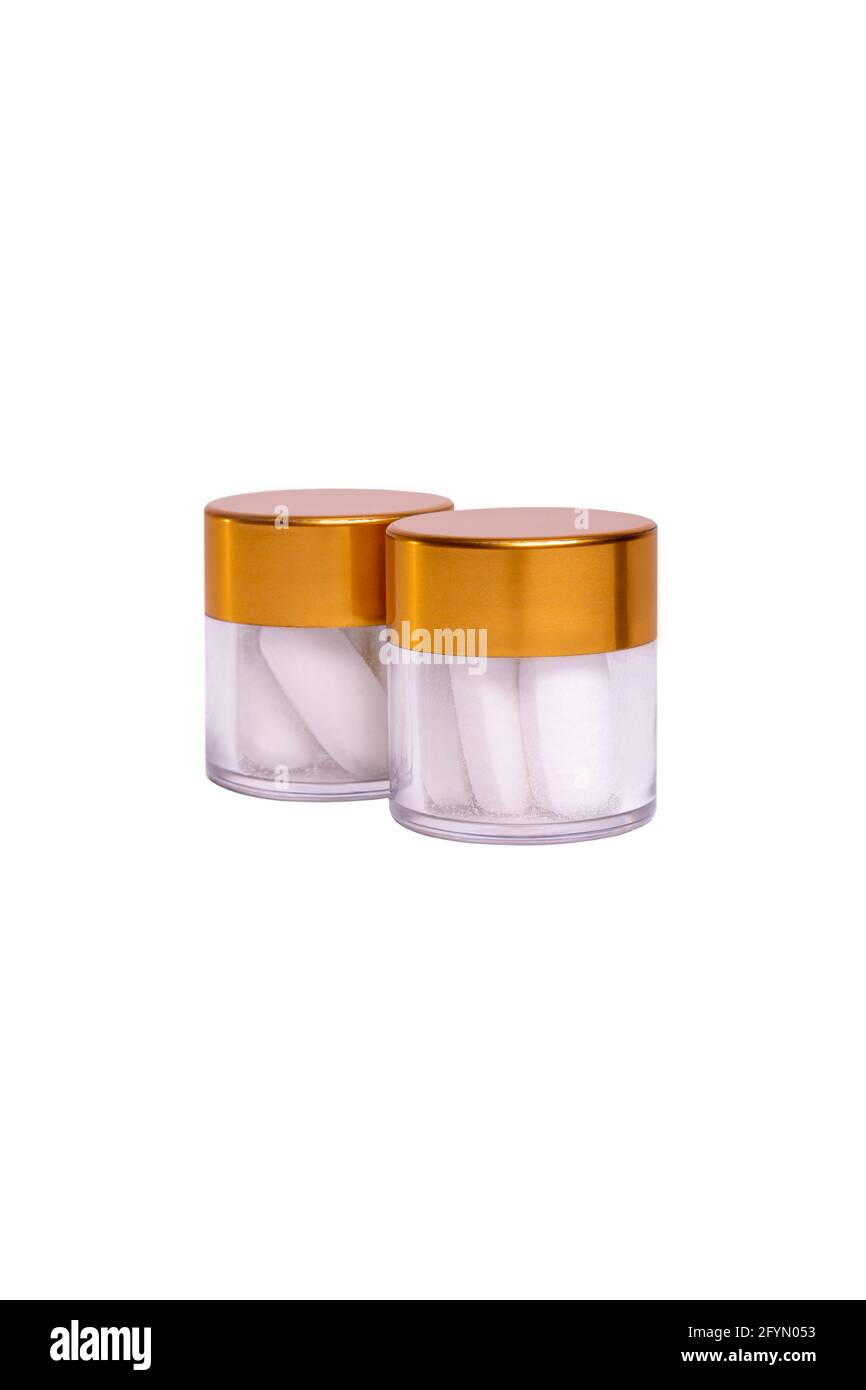 two jars with white pills on a white background Stock Photo