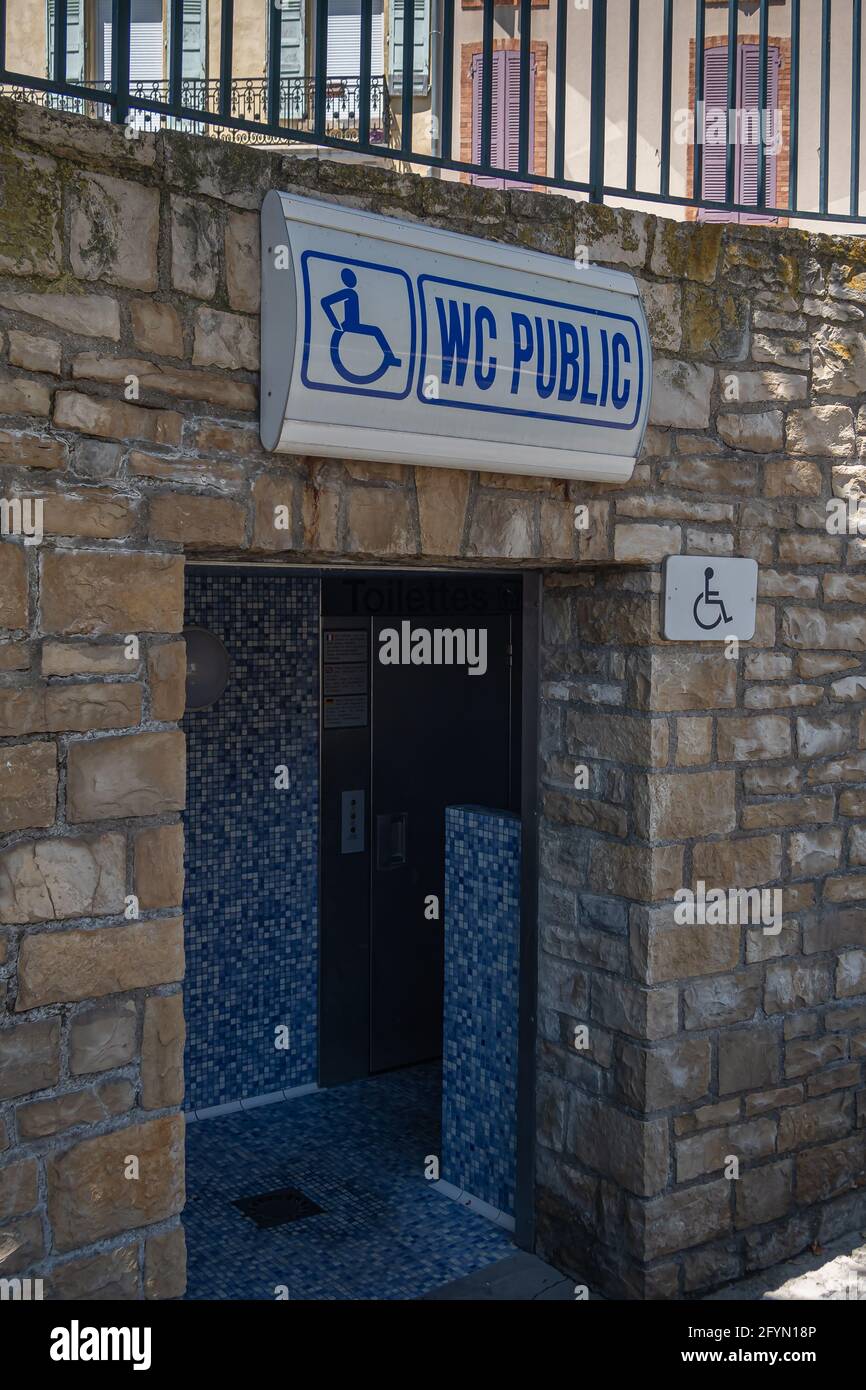 Sisteron, France - July 7, 2020: Public toilet - WC in the town center of Sisteron Stock Photo