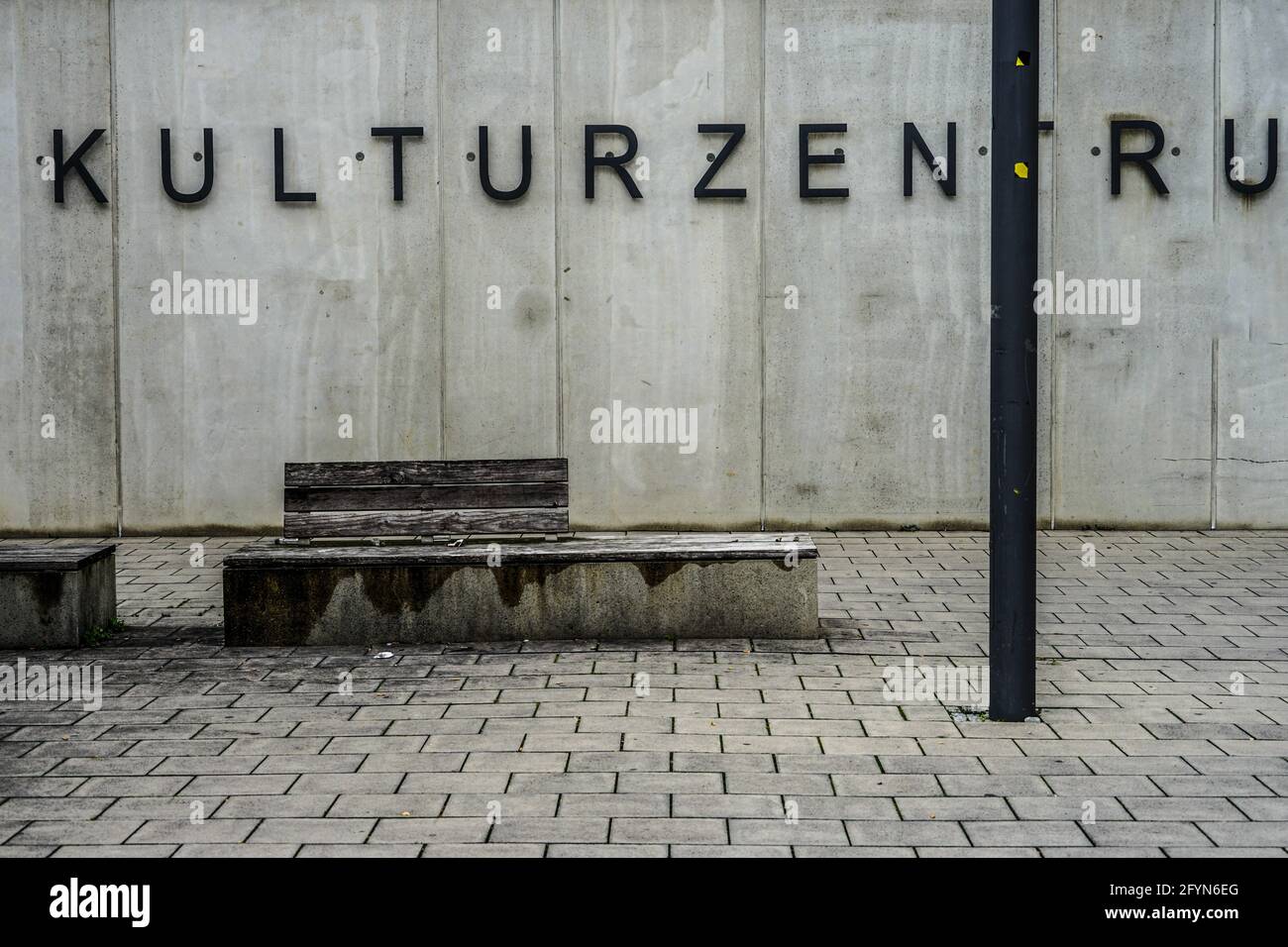 View of a bench in front of the cultural centre in Munich Hasenbergl. Stock Photo
