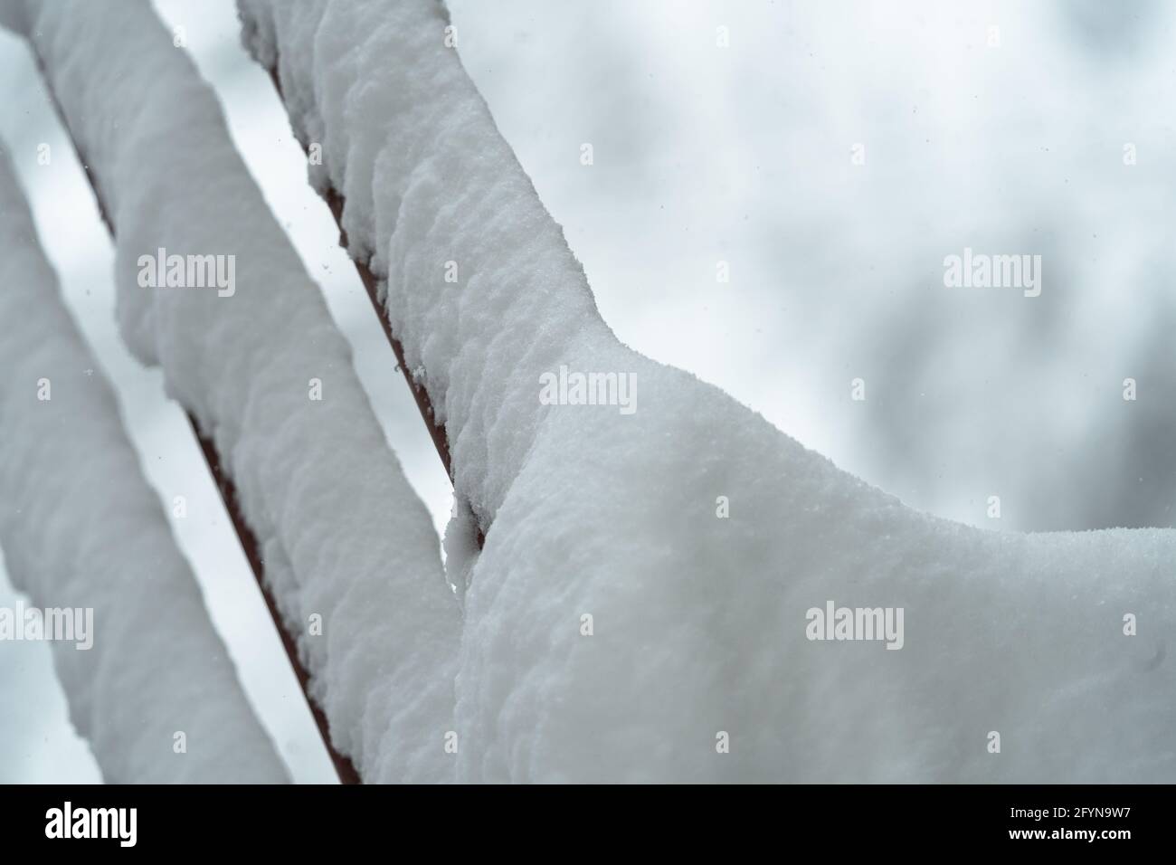 Detail of a snow-covered industrial stair railing in winter Stock Photo ...