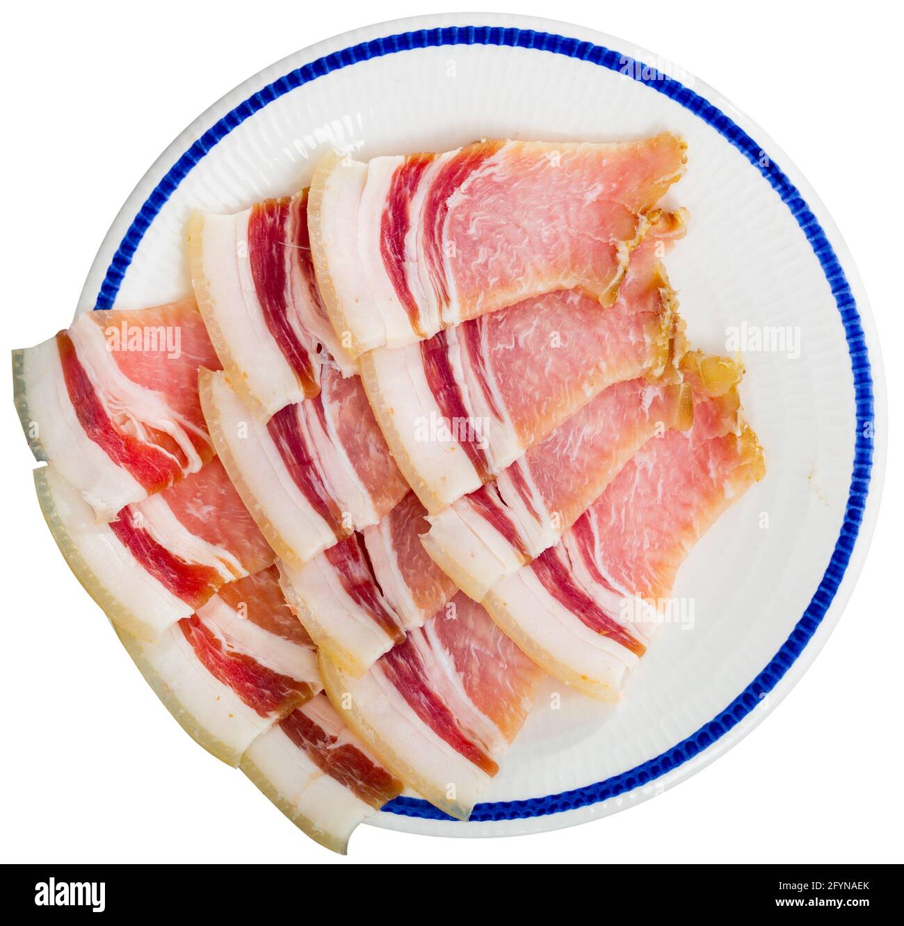 Appetizing jucy slices of fresh sliced bacon on a platter. Isolated over white background Stock Photo