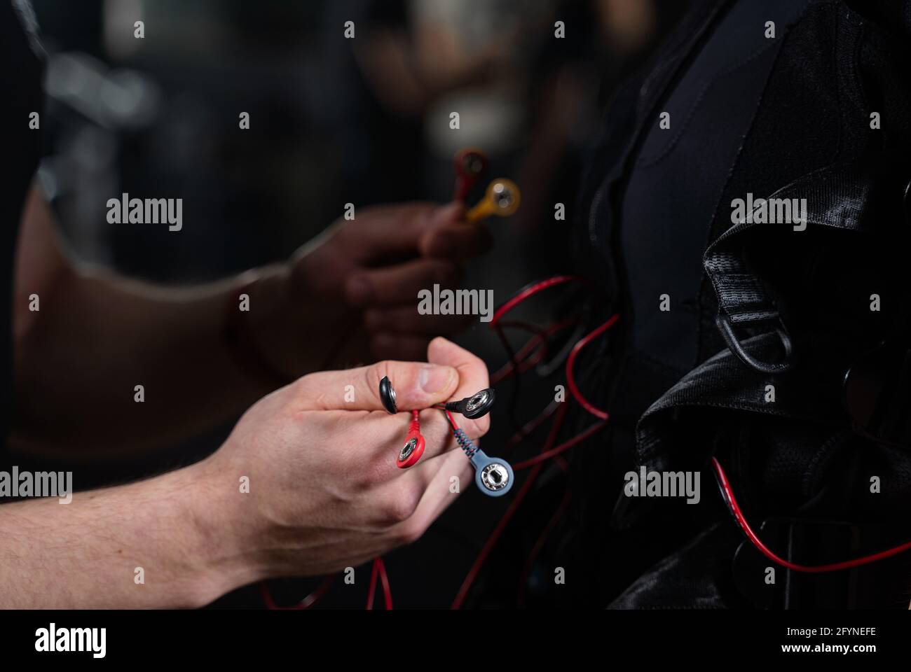 Muscle stimulator with electrodes, the massager on the buttocks and legs.  Rehabilitation and treatment, weight loss and. Soft contrast Stock Photo -  Alamy