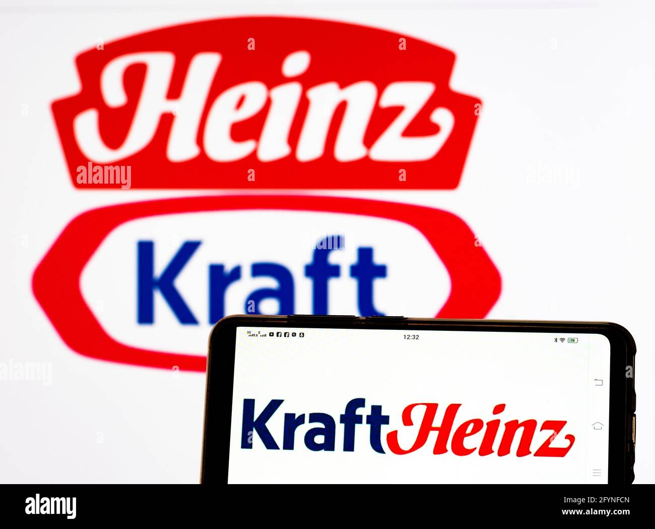 In this photo illustration The Kraft Heinz Company logo seen displayed