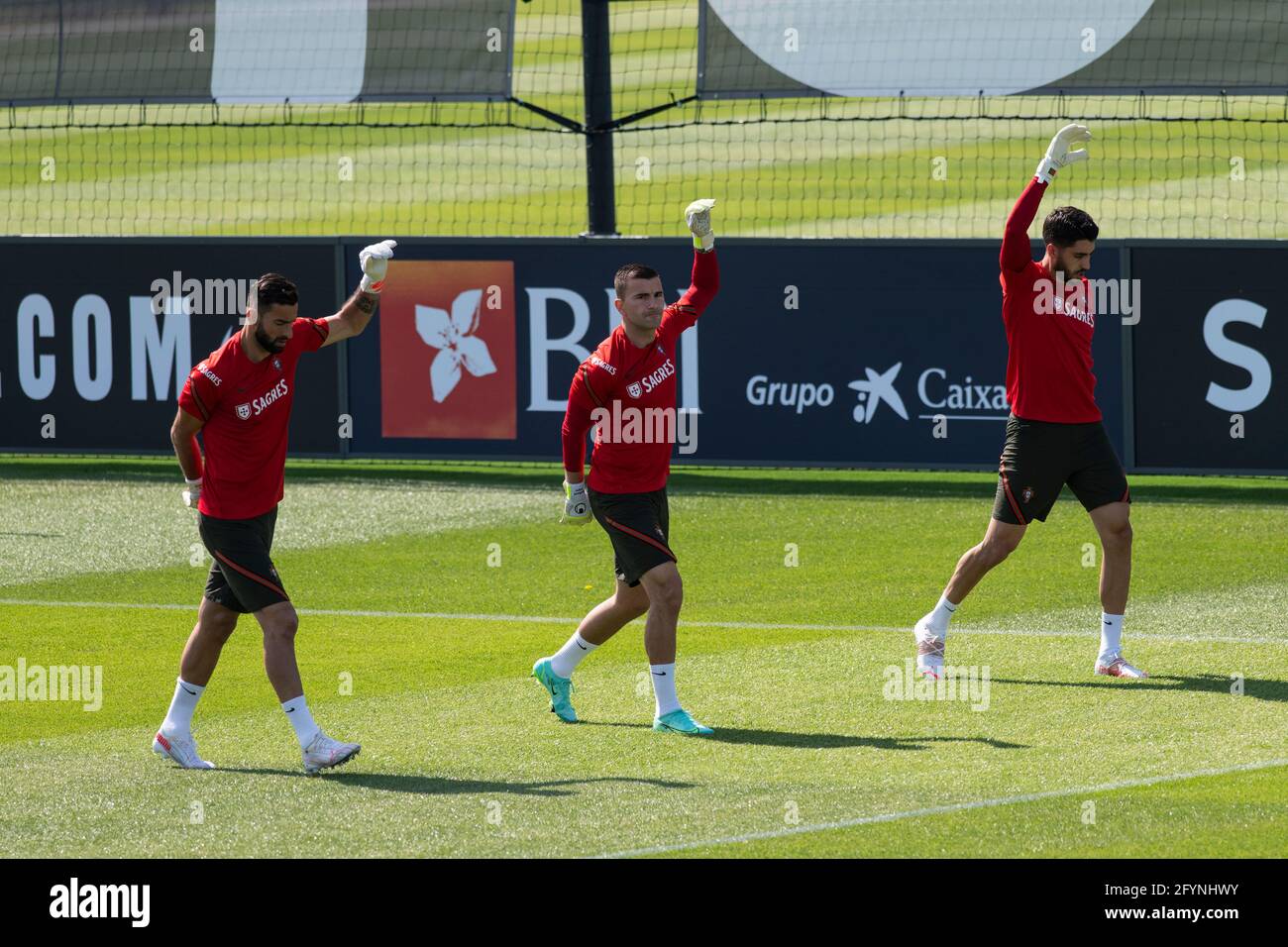 Oeiras, Portugal. 29th May, 2021. Goalkeepers Rui Patricio (L), Anthony Lopes (C) and Rui Silva (R) of Portugal seen in action during the training session at Cidade do Futebol training ground in Oeiras.Portugal football team trains before competing in the European football championship - EURO 2020 - scheduled to start on June 11th. Credit: SOPA Images Limited/Alamy Live News Stock Photo