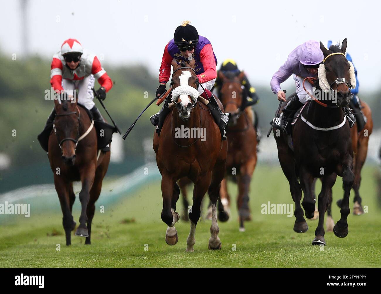 King's Lynn ridden by Oisin Murphy (centre) wins the Betway Achilles Stakes at Haydock Park Racecourse in Newton-le-Willows, Merseyside. Picture date: Saturday May 29, 2021. Stock Photo