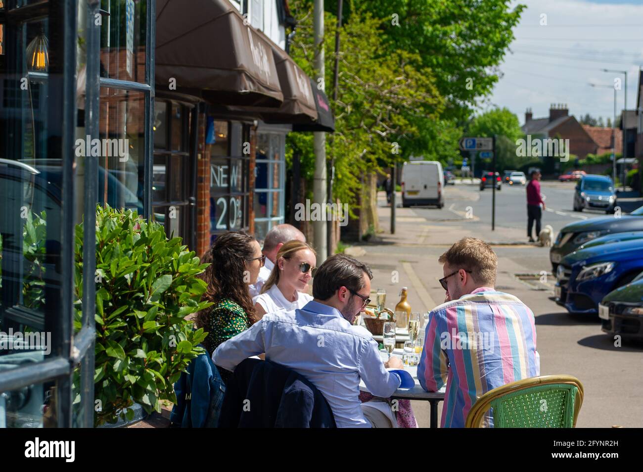 Old Amersham, Buckinghamshire, UK. 29th May, 2021. Customers enjoying a spot of lunch Al Fresco at Cote Brasserie. People were out enjoying the beautiful warm sunshine today in Amersham Old Town following the lifting of more of the Covid-19 restrictions. Credit: Maureen McLean/Alamy Live News Stock Photo