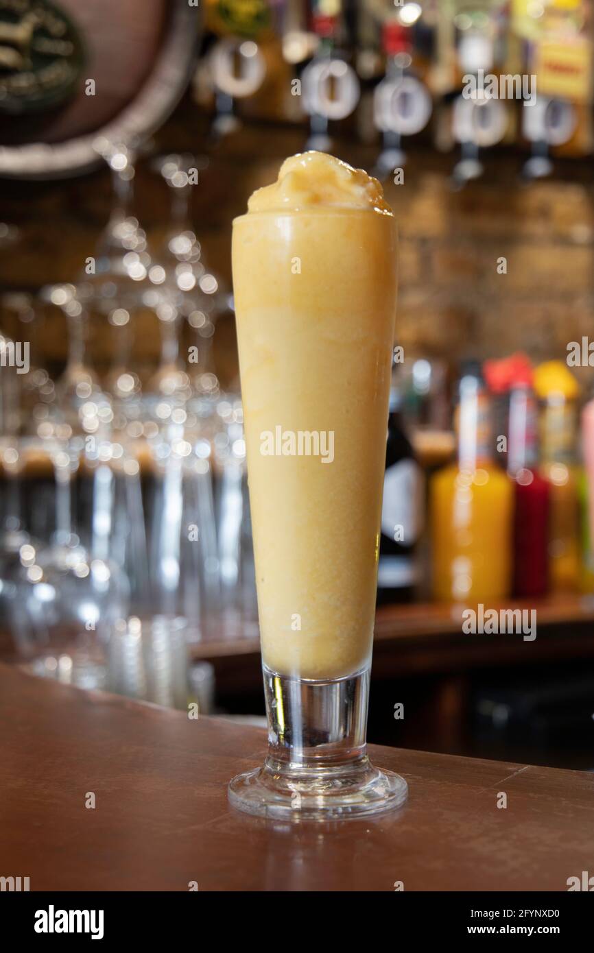 A clean photo of a Mango Daiquiri, prefessionally made in an Irish Pub. Stock Photo