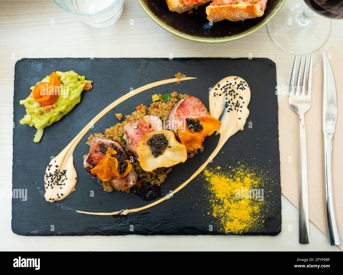 Roasted tuna steak with quinoa, high protein meal with healthy fats