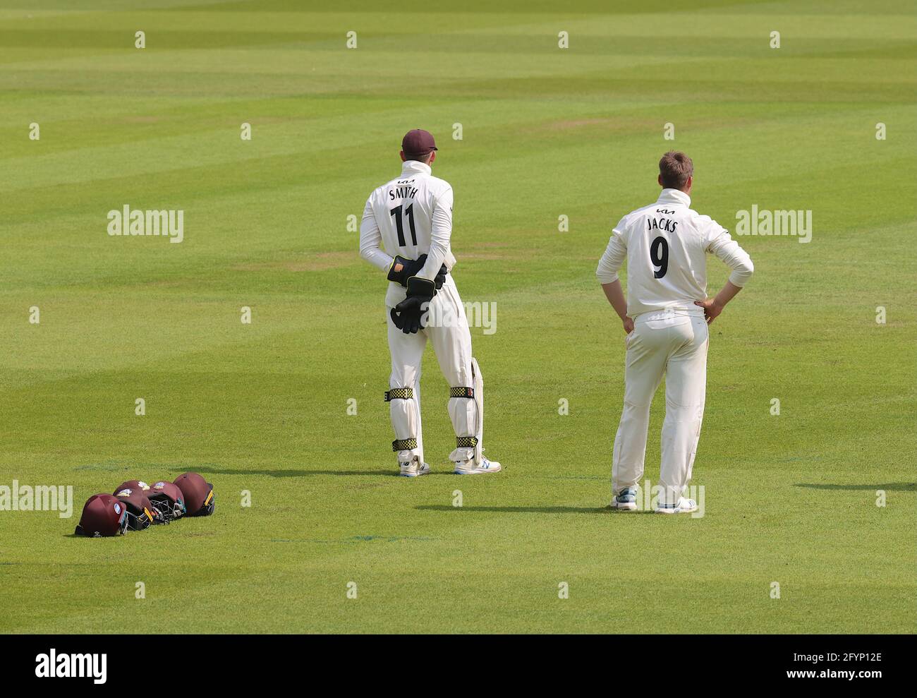 London, UK. 29 May, 2021. London, UK. A line of helmets as Surrey take on Gloucestershire in the County Championship at the Kia Oval, day three David Rowe/Alamy Live News Stock Photo