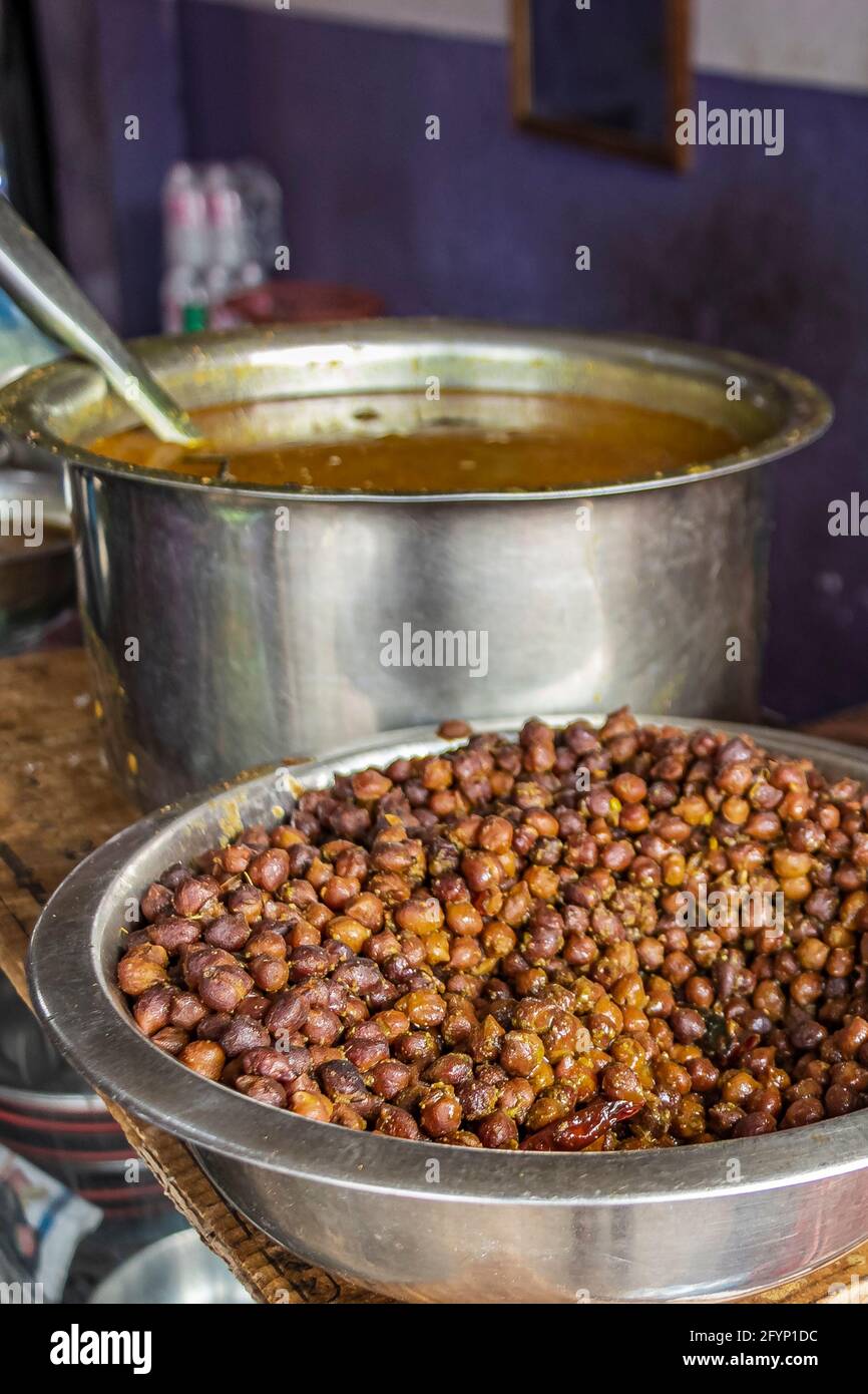 Nepalese food breakfast with Sel Roti and chickpeas. Ring Road in