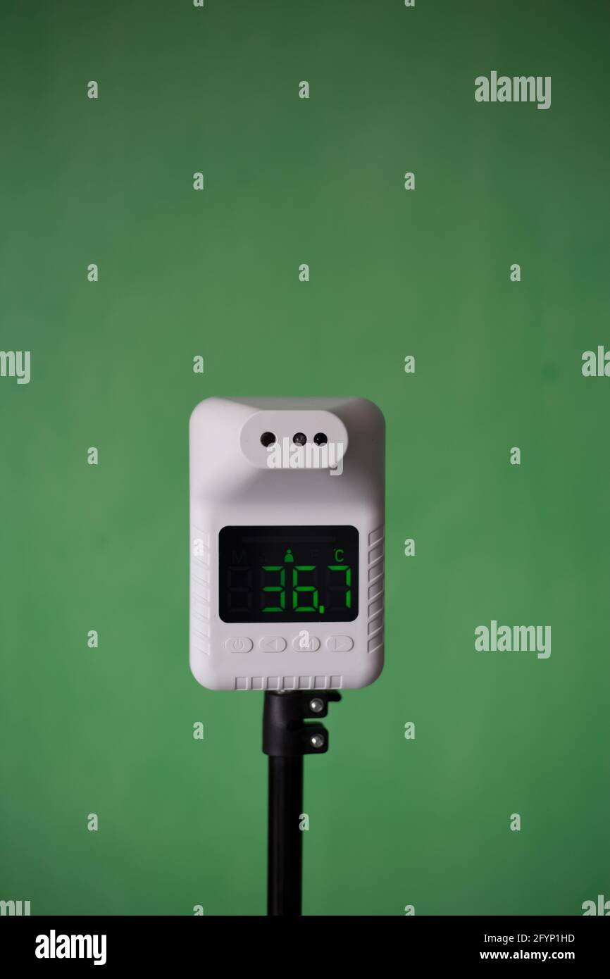 Closeup shot of thermometer scanner, Automatic thermometer for checking ...