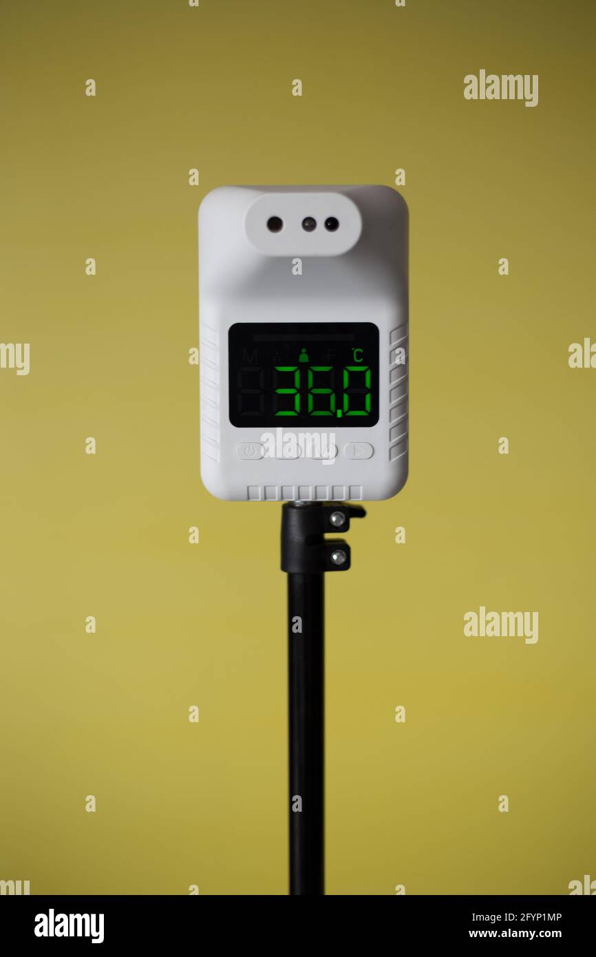 Closeup shot of thermometer scanner, Automatic thermometer for checking ...