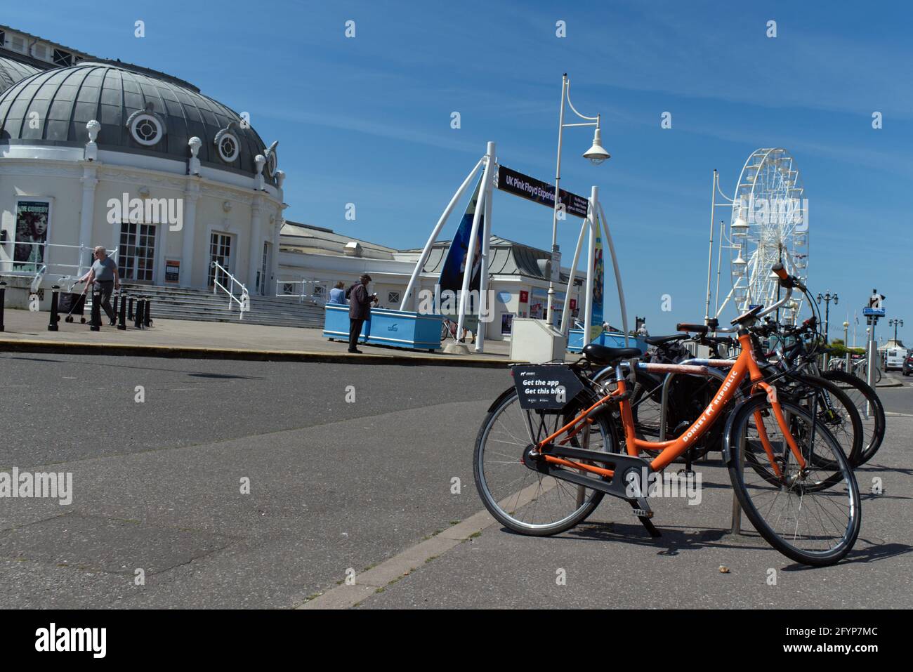 Bike rental in Worthing West Sussex by Donkey Republic on the seafront by the Worthing Pier. Stock Photo