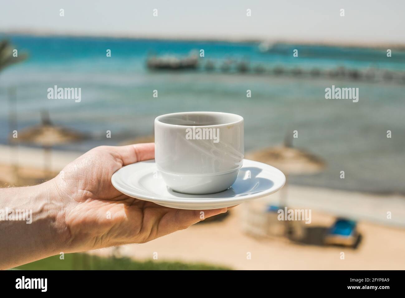 https://c8.alamy.com/comp/2FYP8A9/man-hands-holding-cup-of-coffee-good-morning-sunrise-concept-lets-start-a-new-day-space-for-text-2FYP8A9.jpg