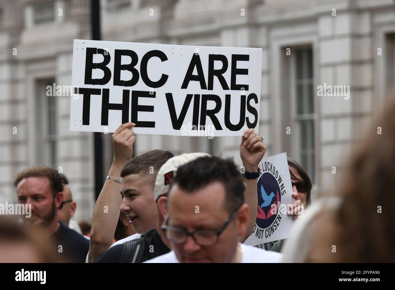 London, UK. 29th May, 2021. Unite for Freedom no COVID passports protestors holding banners march for freedom against Vaccine Passports in London, on 29th May 2021. Credit: Picture Capital/Alamy Live News Stock Photo