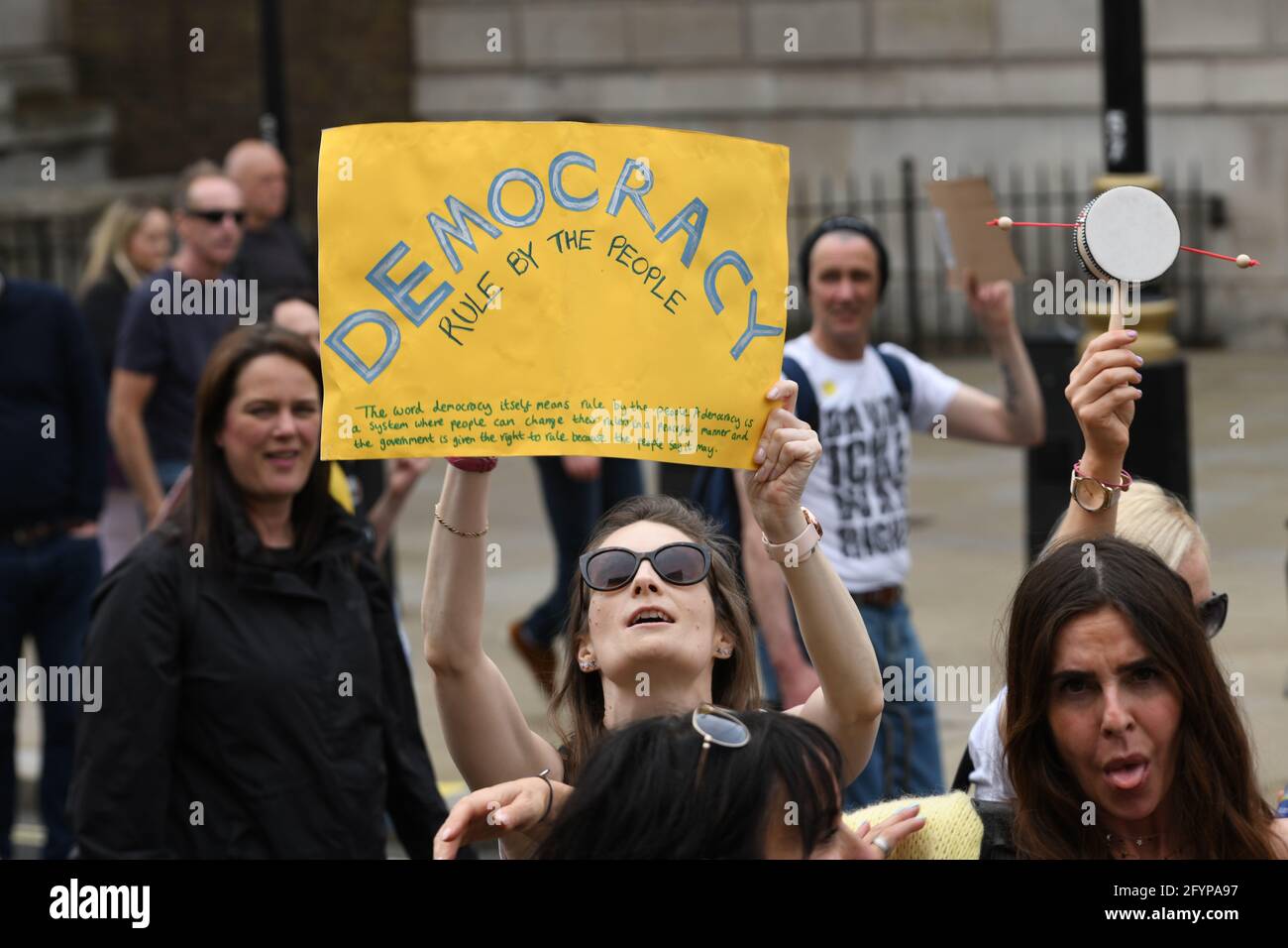 London, UK. 29th May, 2021. Unite for Freedom no COVID passports protestors holding banners march for freedom against Vaccine Passports in London, on 29th May 2021. Credit: Picture Capital/Alamy Live News Stock Photo