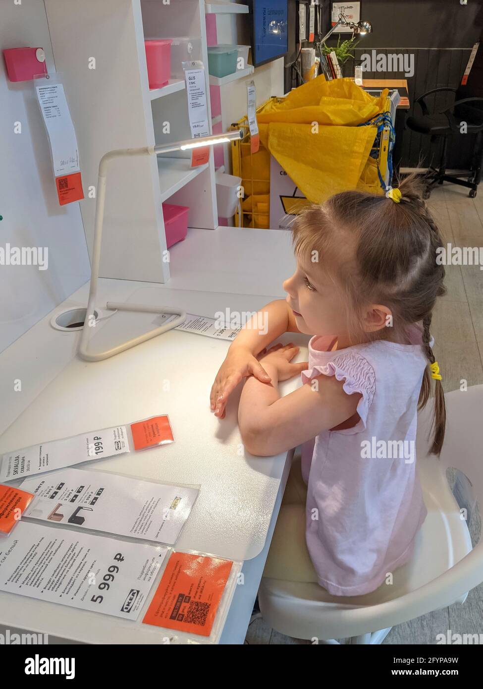 05.23.2021 Ikea, Moscow, Russia. family chooses furniture in the children's room in the store Stock Photo