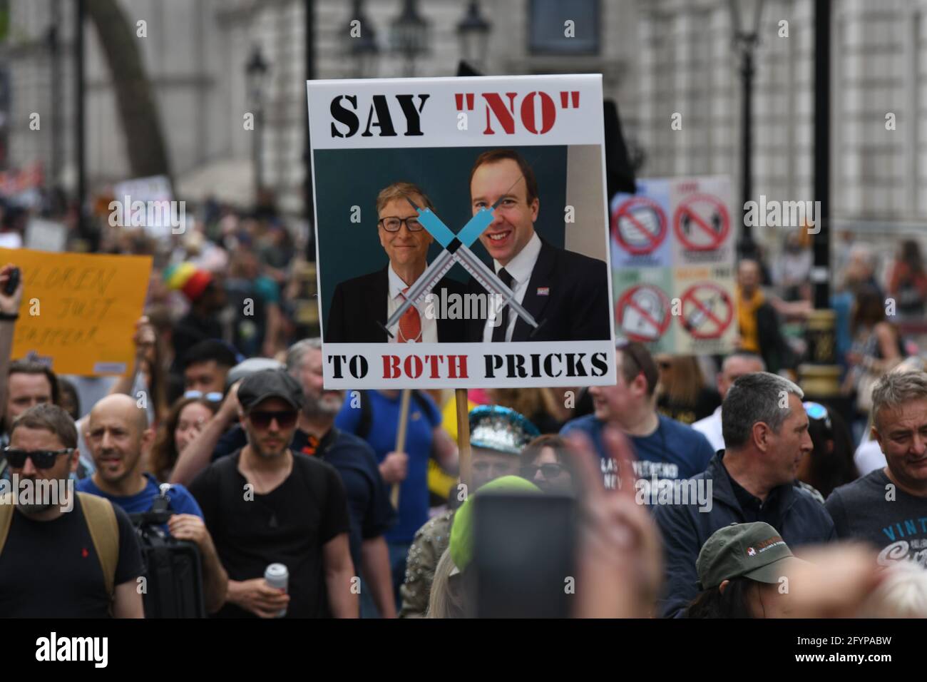 London, UK. 29th May, 2021. Unite for Freedom no COVID passports protestors holding banners march for freedom against Vaccine Passports in London, on 29th May 2021. Credit: Picture Capital/Alamy Live News Stock Photo