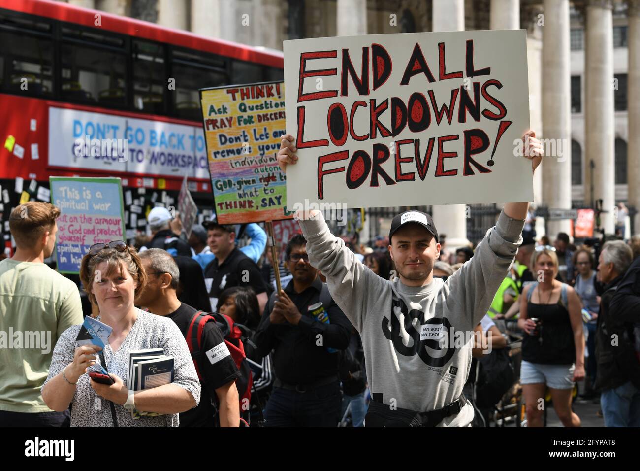 London, UK. 29th May, 2021. Unite for Freedom no COVID passports protestors holding banners march for freedom against Vaccine Passports in London, on 29th May 2021. Credit: Picture Capital/Alamy Live News Stock Photo
