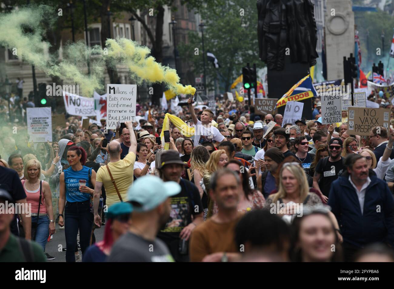 London, UK. 29th May, 2021. Unite for Freedom no COVID passports protestors holding banners march for freedom against Vaccine Passports in London, on 29th May 2021. Credit: Picture Capital/Alamy Live News Stock Photo