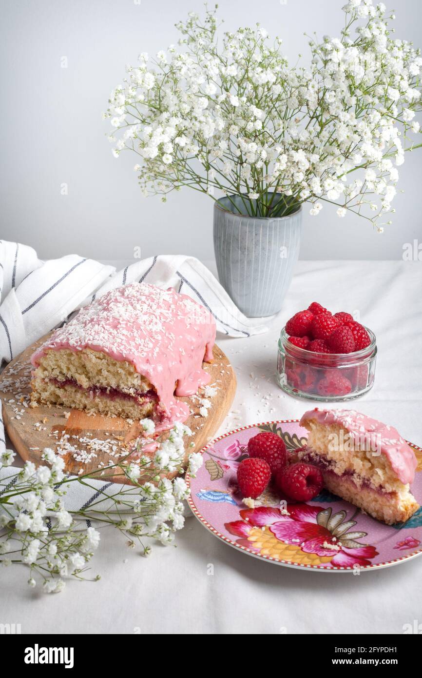 Raspberry and coconut cake still life Stock Photo Alamy