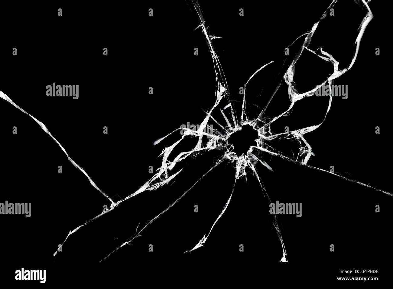 Cracked glass isolated on black background, texture for design, window