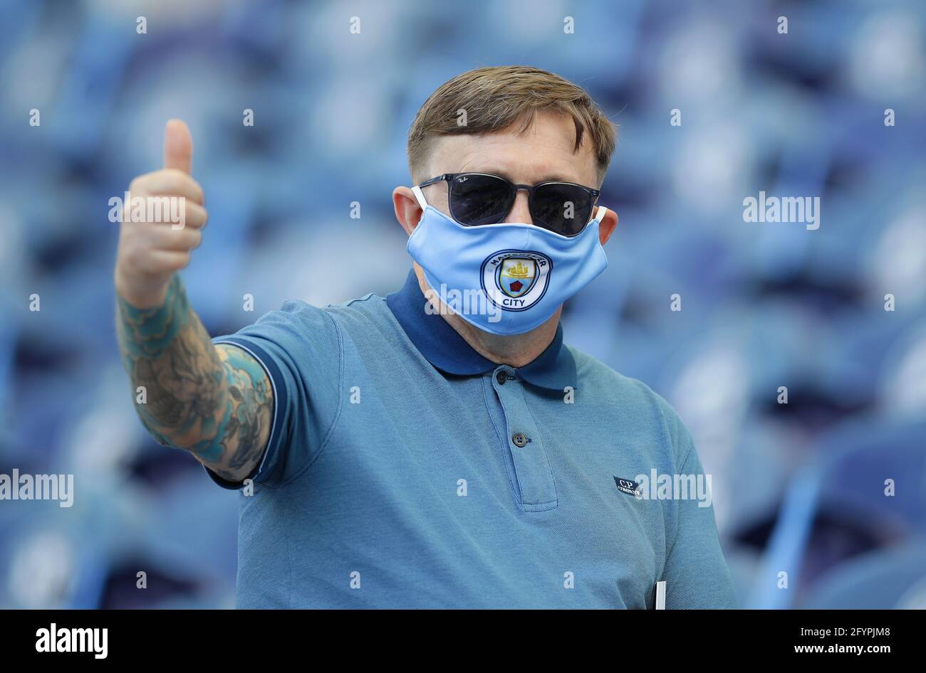 Porto, Portugal, 29th May 2021. Manchester City fan in mask takes his seat during the UEFA Champions League match at the Estadio do Dragao, Porto. Picture credit should read: David Klein / Sportimage Stock Photo