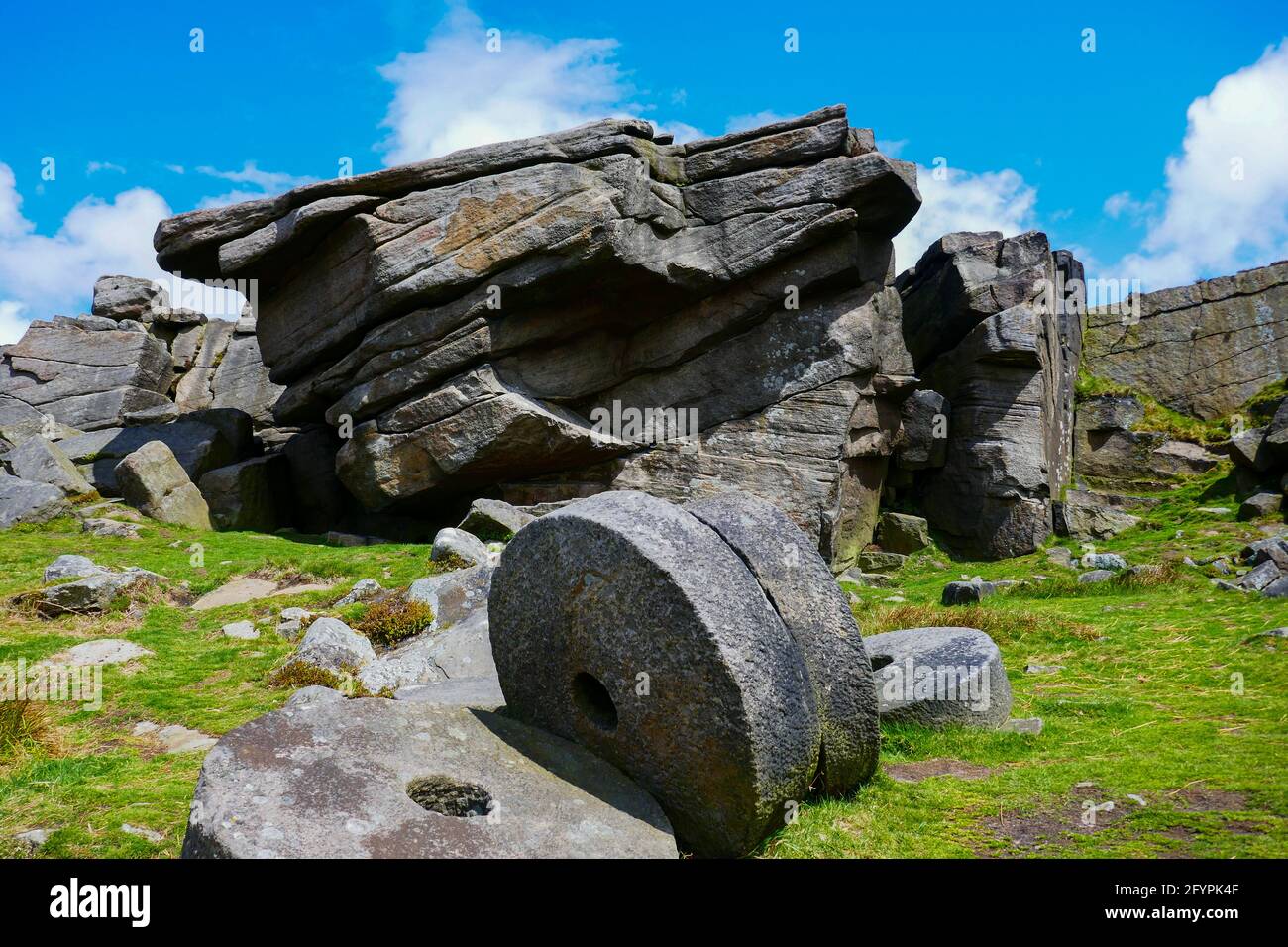 Abandoned millstones at the gritstone edge of Stanage, Peak District, Derbyshire Stock Photo