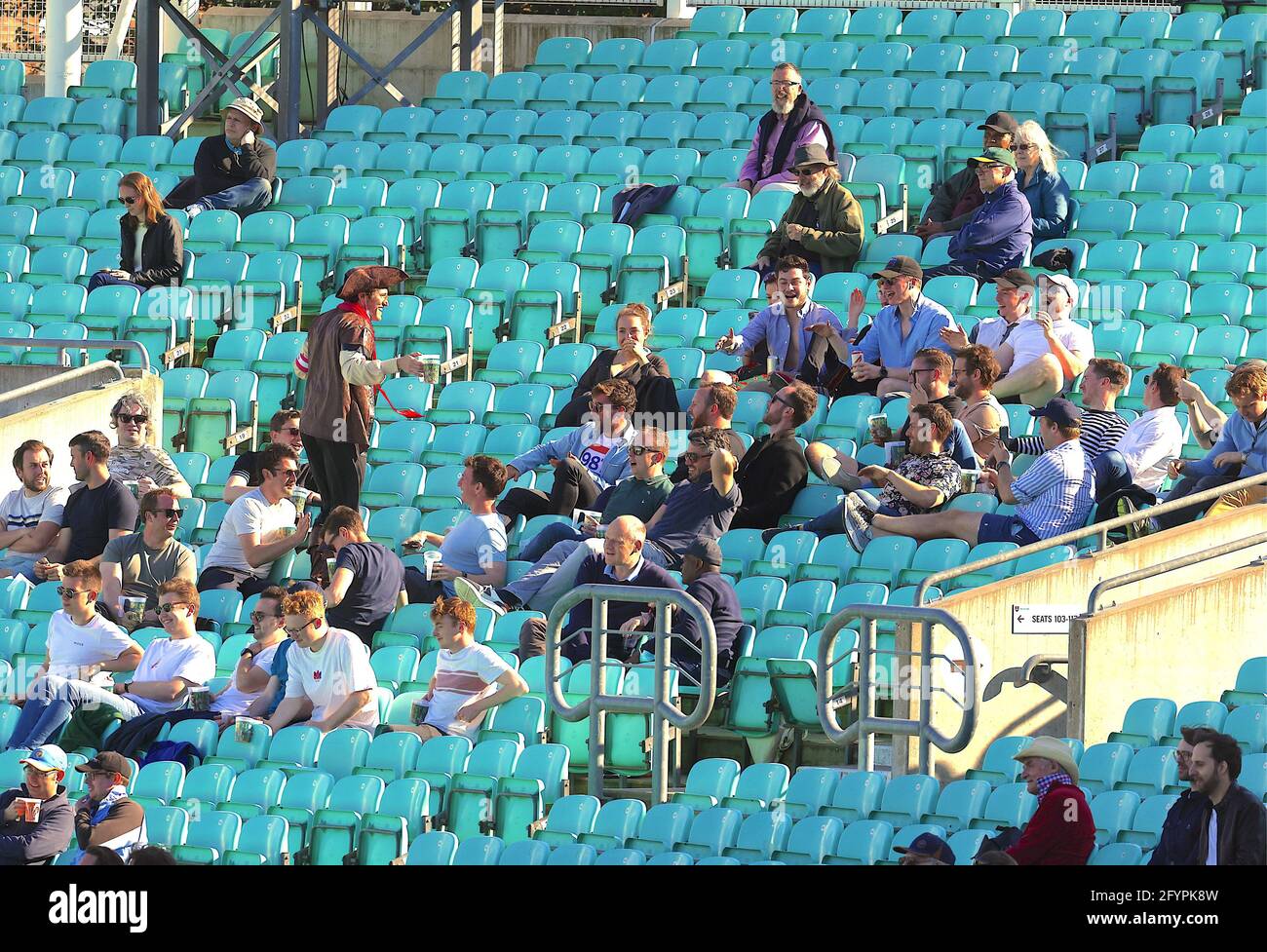 London, UK. 29 May, 2021. London, UK. The crowd enjoying the cricket and an nice bit of evening sunshine as Surrey take on Gloucestershire in the County Championship at the Kia Oval, day three David Rowe/Alamy Live News Stock Photo